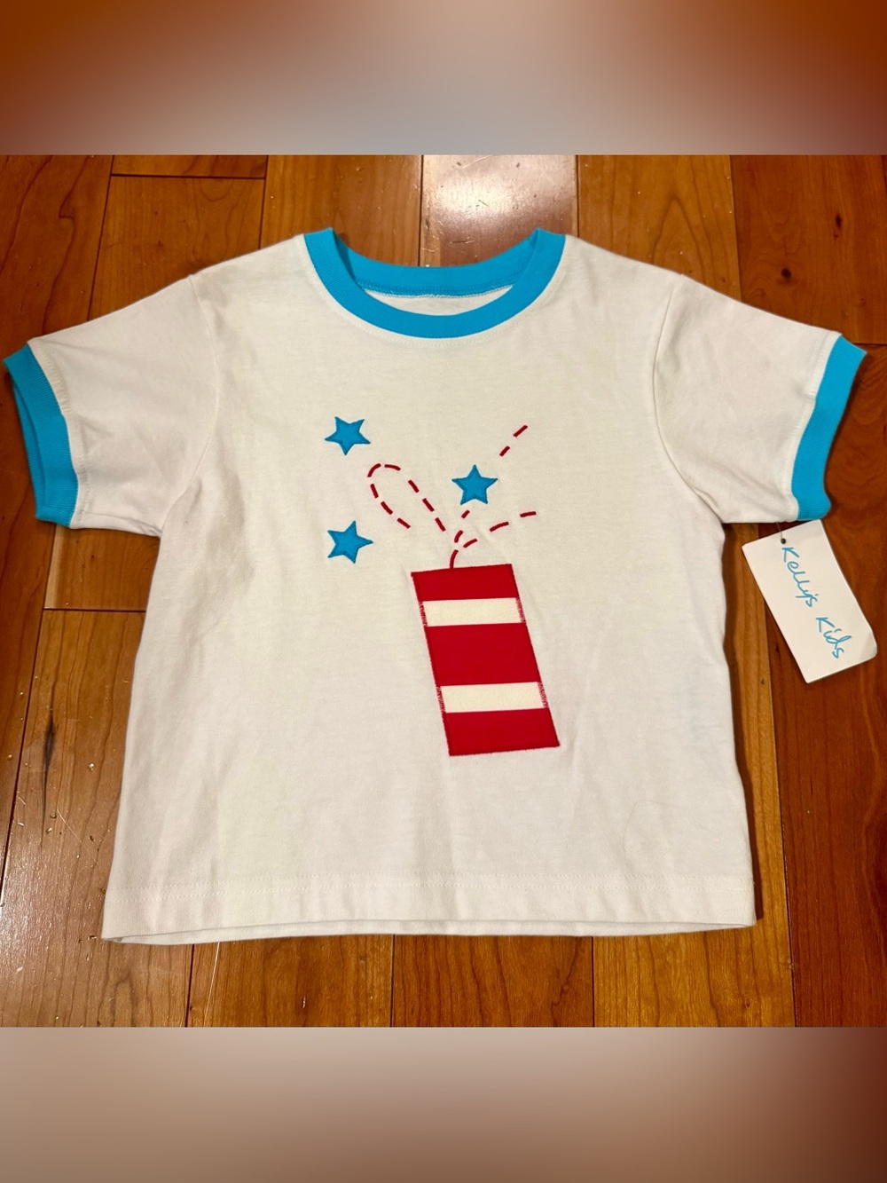 NWT Kelly's Kids White Tee with Blue Trim and Red Stripe Embroidered Firework